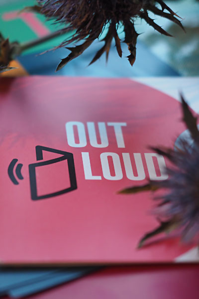 Foto vom OUT LOUD-Flyer